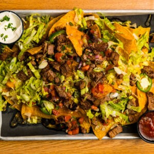 Brisket nachos on a plate